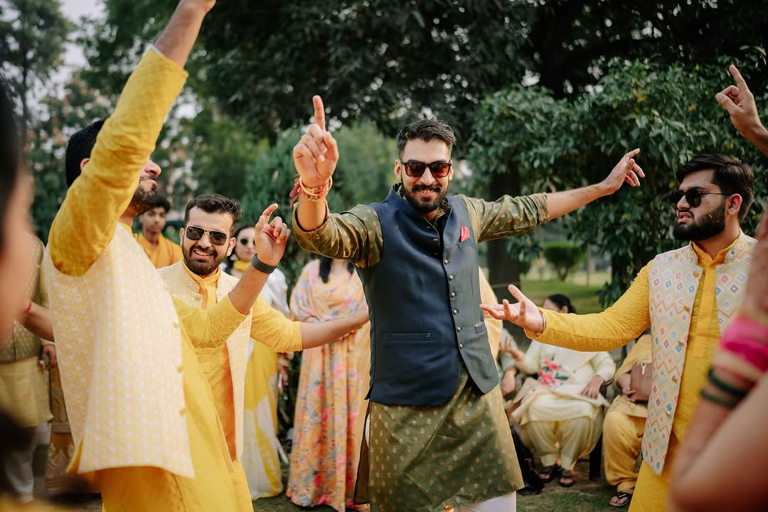 Groom dancing during the baraat