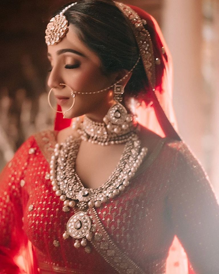 Bridal portrait in red and gold